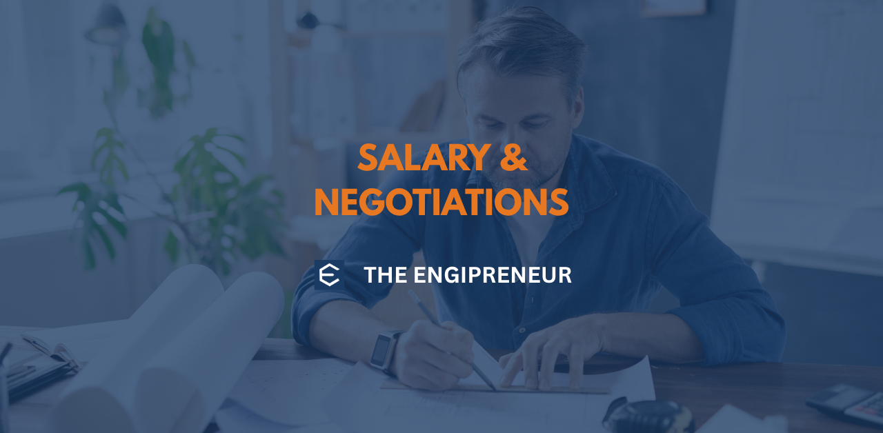 Engineer reviewing salary data on laptop to benchmark engineering compensation and market rate